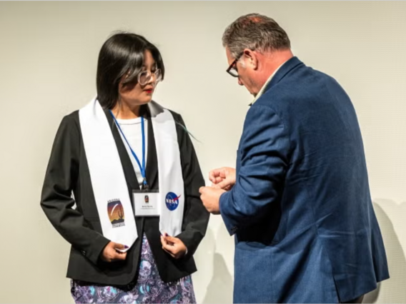 Kiera Charley receive Space Grant graduation stole. 