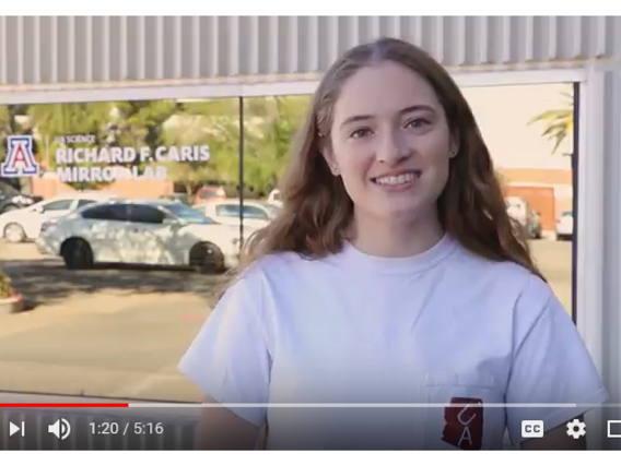 Jenny Calahan in front of window to UA MirrorLab
