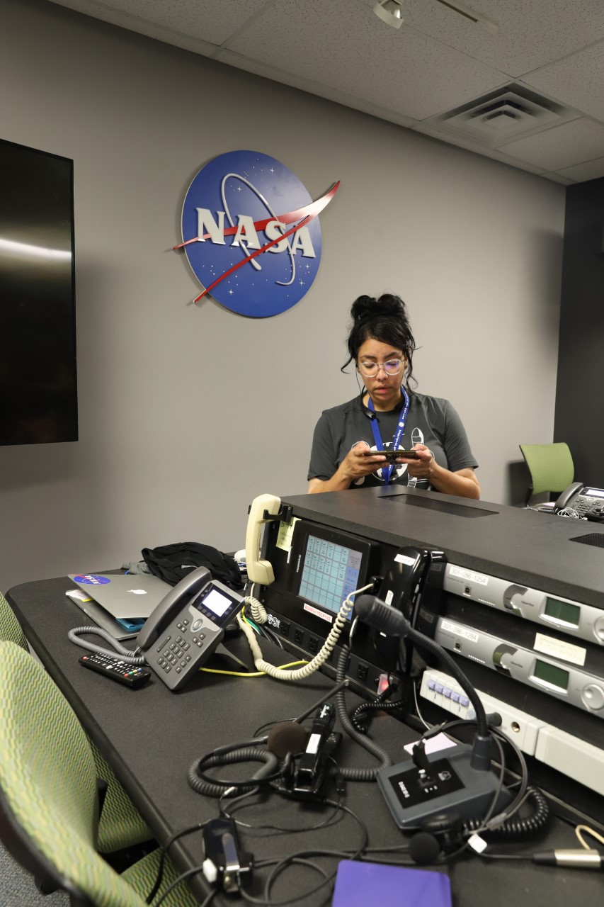 Rosemary Ferreira inside the NASA Goddard communications control room.
