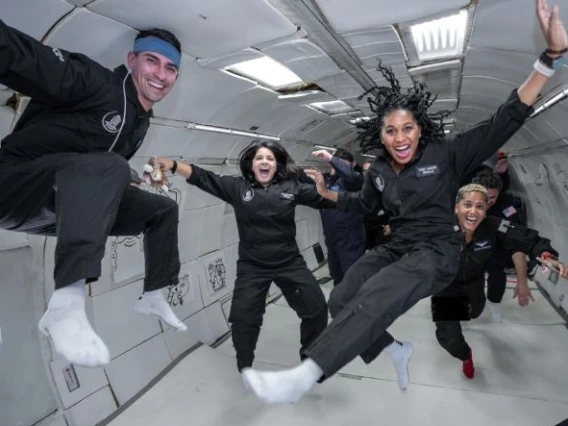 Trent Tresch (left) during the microgravity flight campaign from Kennedy Space Center. Photo credit, Trent Tresch.