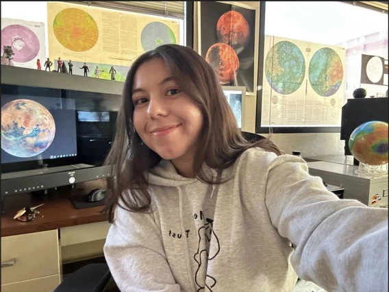 Dora Elalaoui-Pinedo at her Lunar and Planetary Laboratory workspace