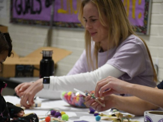 Shae Henley with one of the students at Erickson Elementary's Math and Science Night