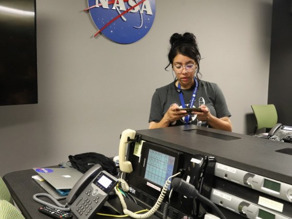 Rosemary Ferreira inside the NASA Goddard communications control room.
