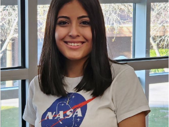 Sandra Montero in NASA shirt.