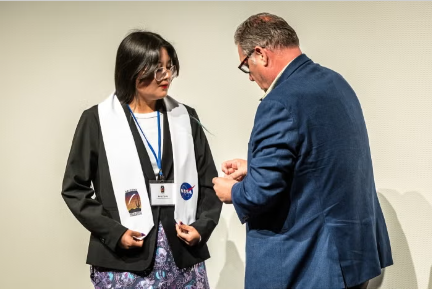 Kiera Charley receive Space Grant graduation stole.