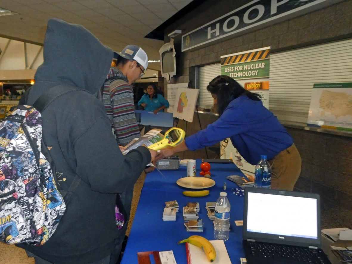 Angelita Denny interacts with students at STEM Outreach activity.