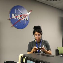 Rosemary Ferreira inside the NASA Goddard communications control room.