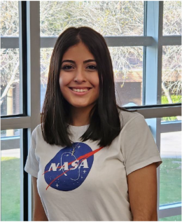 Sandra Montero in NASA shirt.