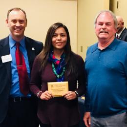 Rayanna Benally holds SNRE's Fall 2017 Outstanding Graduating Senior Award, with her mentor Steven Archer, and Shane Burgess - Dean of College of Agriculture and Life Sciences